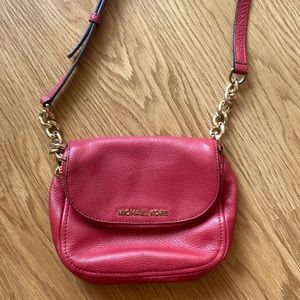 Michael Kors Red crossbody purse with gold zipper details